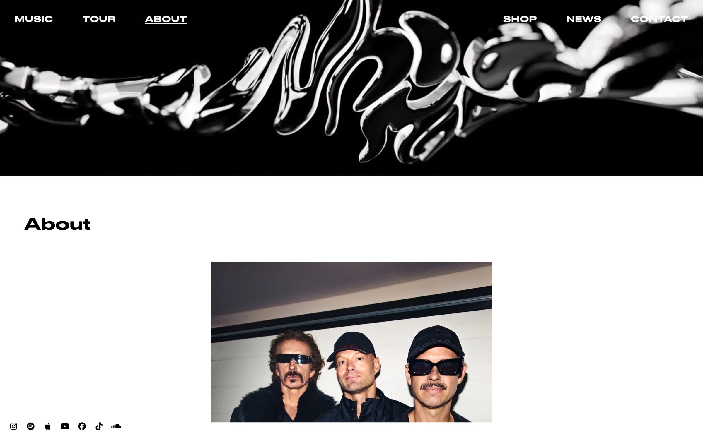 The about page on desktop, the band’s logo as a liquid chrome shape above a photo of the trio