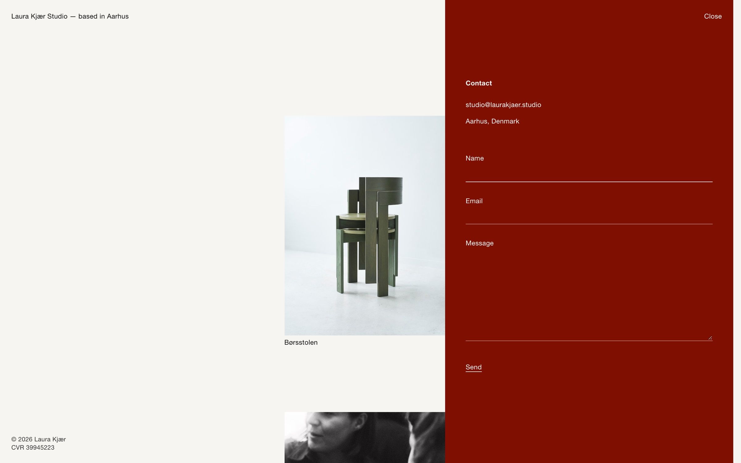 The contact panel on desktop, a deep red drawer with email, address and a simple form